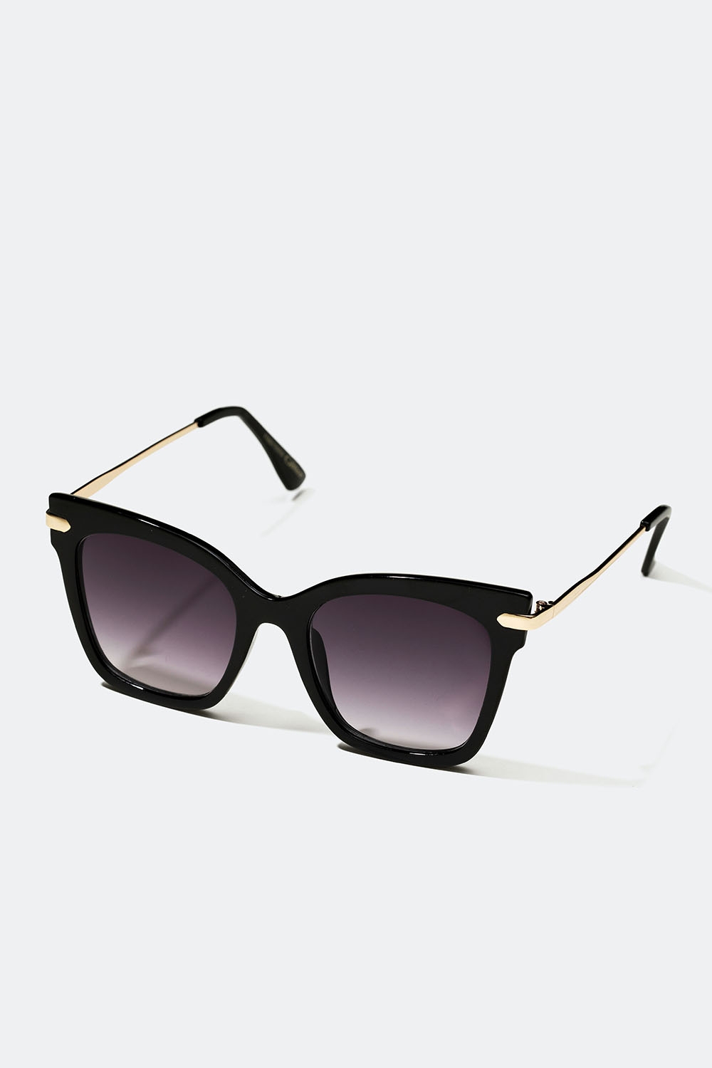 Svarte solbriller i cateye-modell med gullfarget detalj i gruppen Accessories / Solbriller hos Glitter (176001169000)