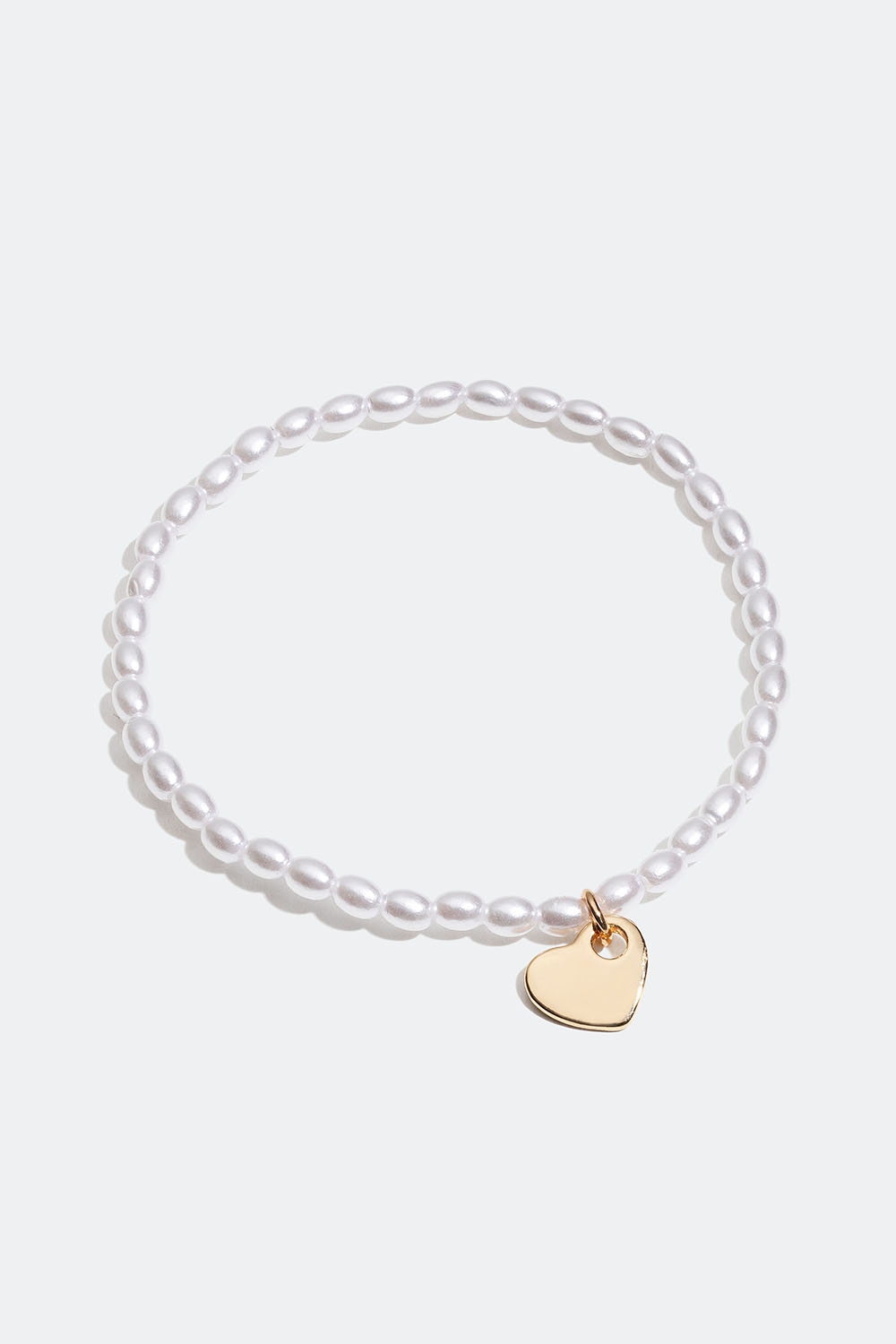 Armbånd med hvite perler og hjerte i gruppen Smykker / Armbånd / Tynne hos Glitter (251000973001)