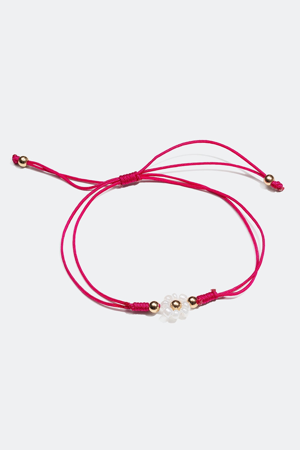 Rosa armbånd med hvit blomst i gruppen Smykker / Armbånd / Tynne hos Glitter (251001035502)