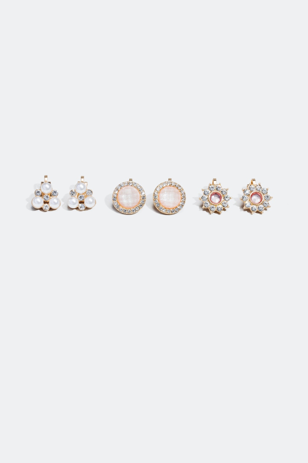 3-pakning med klipsøredobber i rosa, hvitt og gullfargede nyanser i gruppen Smykker hos Glitter (324484)
