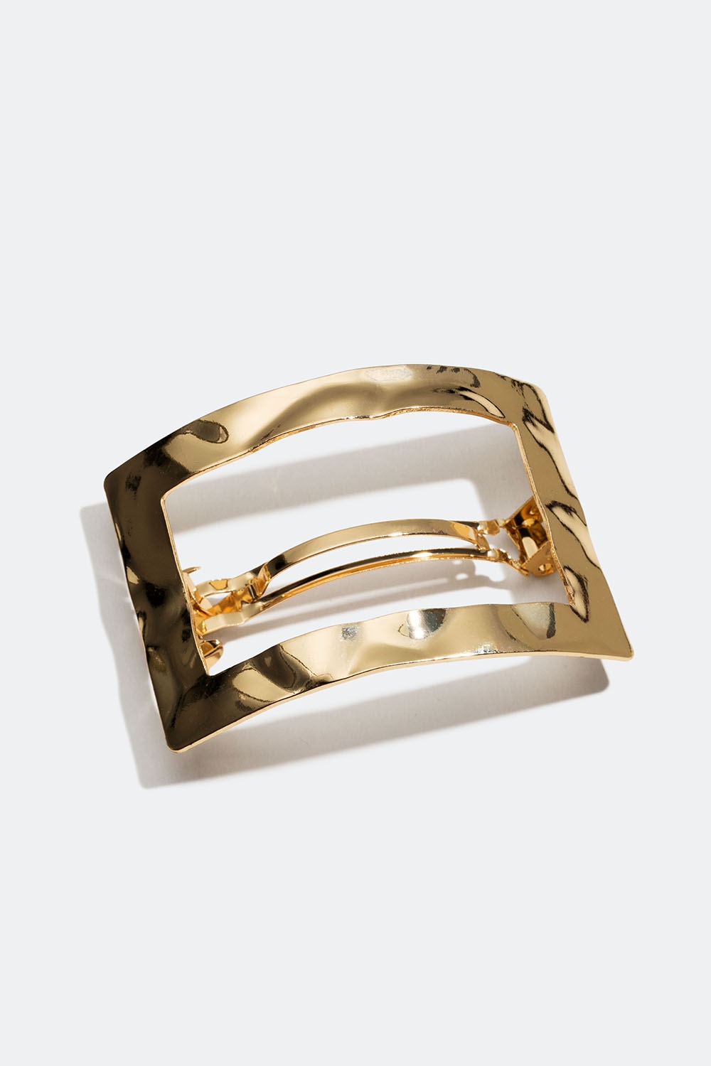 Gullfarget hårspenne med hamret design i gruppen Håraccessories / Spenner & klemmer / Hårspenner hos Glitter (335001042000)