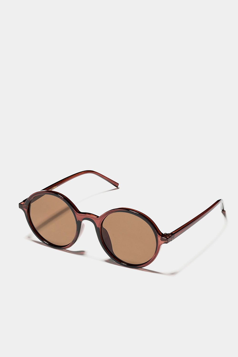Runde solbriller med brune innfatninger