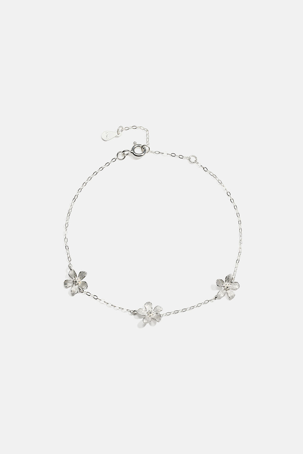Armbånd i ekte sølv med teksturerte blomster